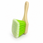Detail Foundry FaceFlow Wheel Brush in green with soft feathered bristles and short tan handle, standing upright