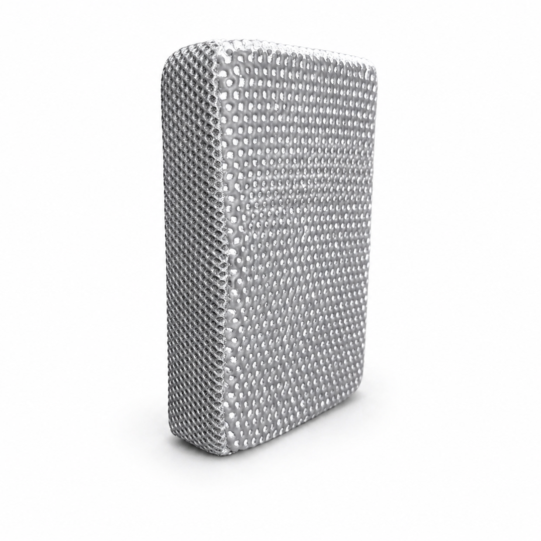 ClayGlide Sponge standing upright showing the full silver clay decontamination face