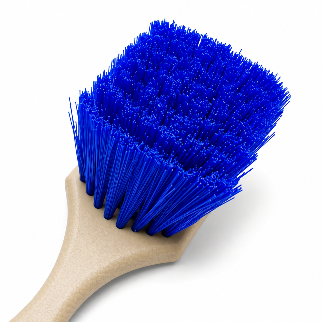 Detail Foundry FaceFlow Wheel Brush in blue, the firmer bristle option, with short tan handle