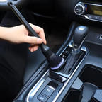 Ultra Soft Detail Brush dusting around a car gear selector and centre console trim