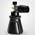 Detail Foundry Snowstorm Foam Cannon — wide-base 1L bottle with measurement markings, adjustable foam dial on top, brass inlet and quick-connect fitting for a pressure washer.